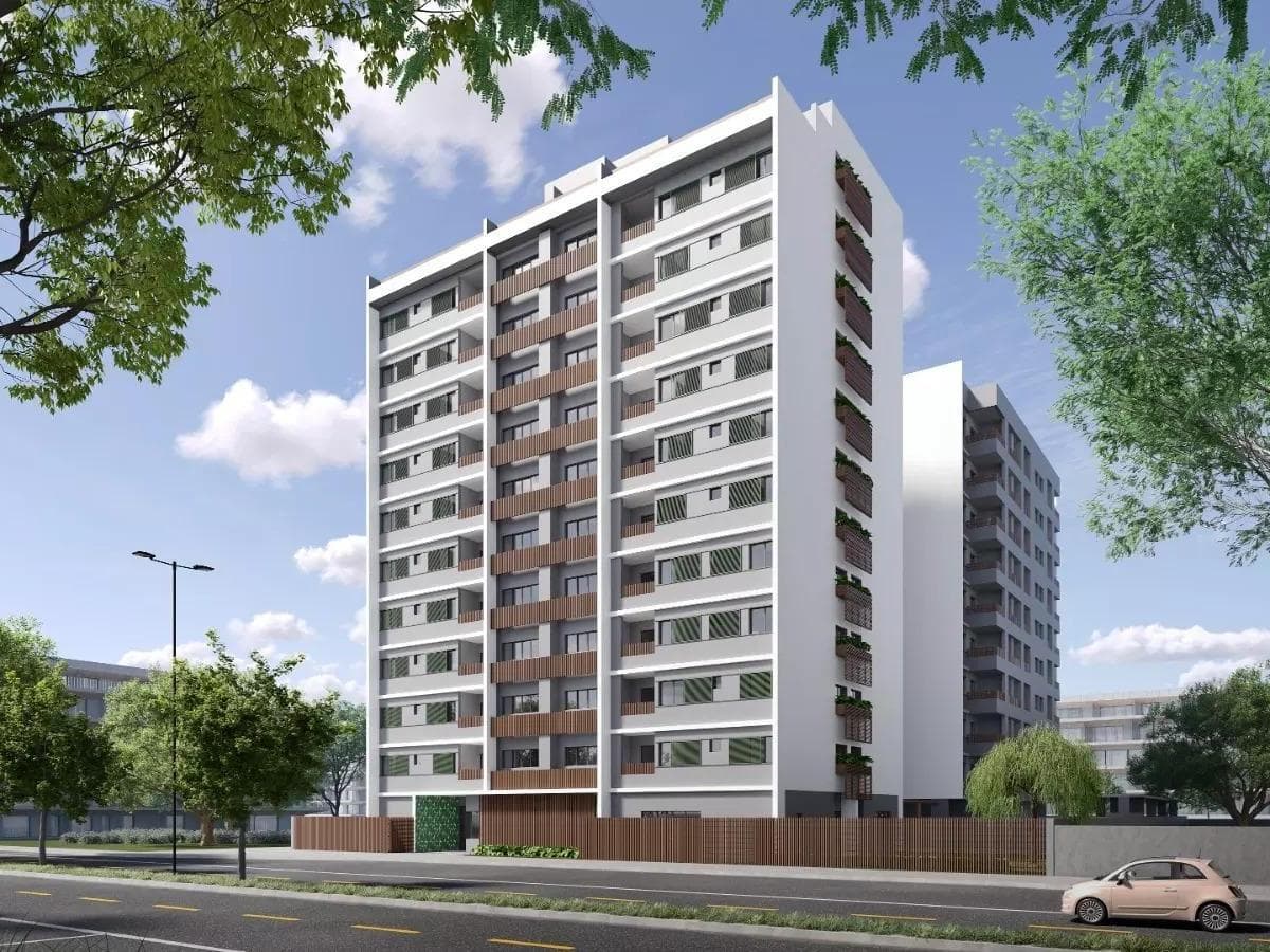 Renderização da fachada do edifício residencial com varandas e vegetação.