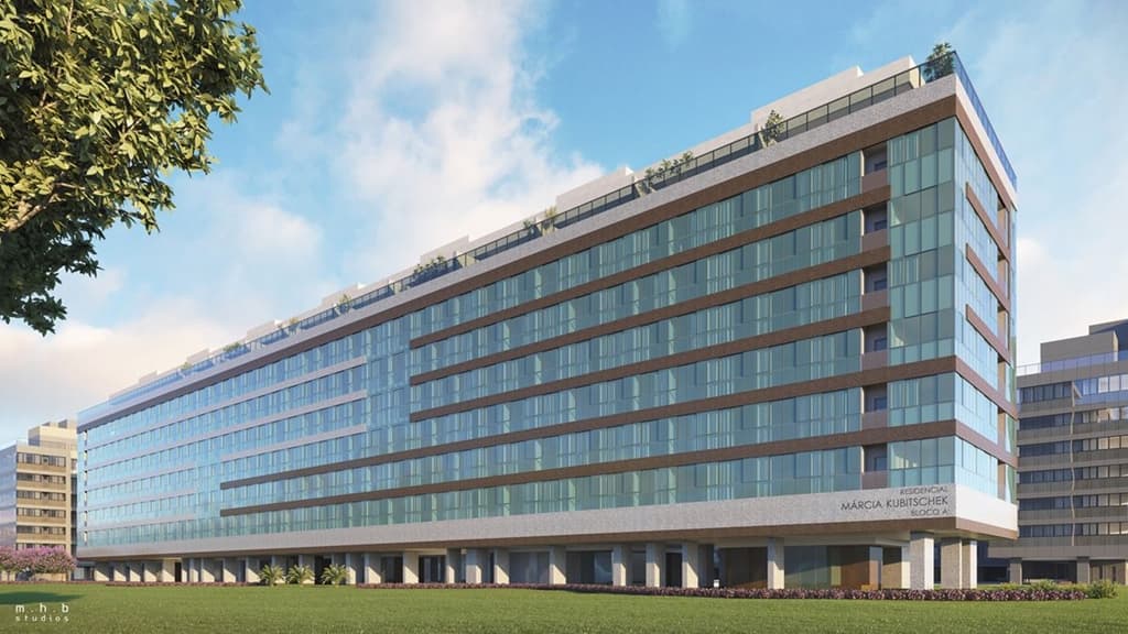 Fachada externa do edifício com estrutura revestida em vidro e tons terrosos